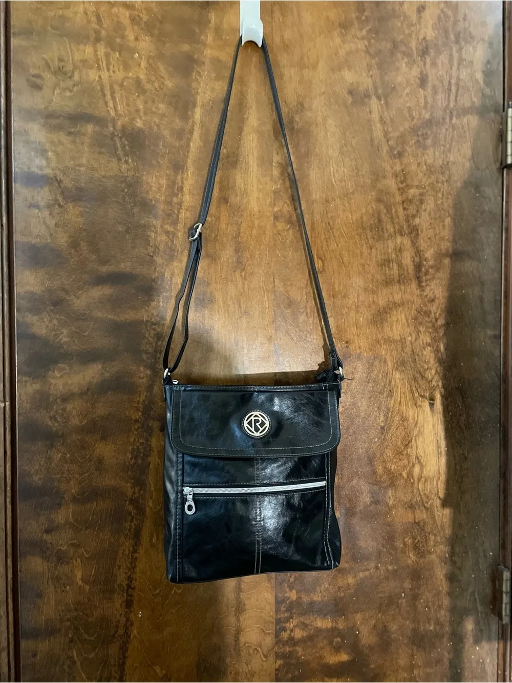 Relic Black Crossbody Bag with Logo Accent